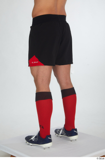 Erling black shorts red socks rugby boots rugby clothing sports…